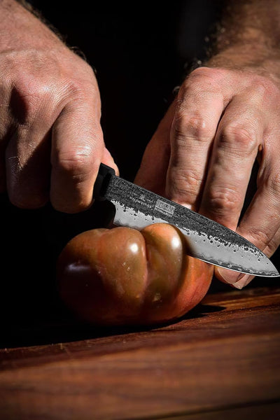 Chef Slicing Brisket